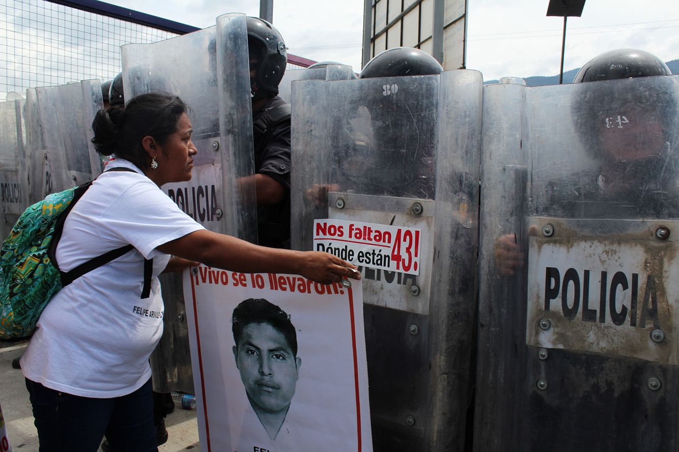 ayotzinapa-sticker-police
