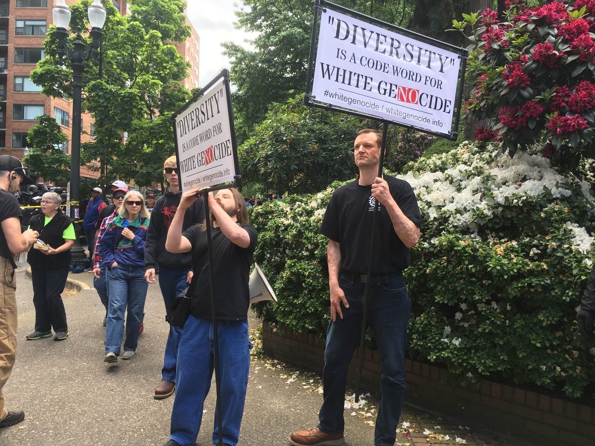 Two participants in Joey Gibson’s 6/4 rally display racist