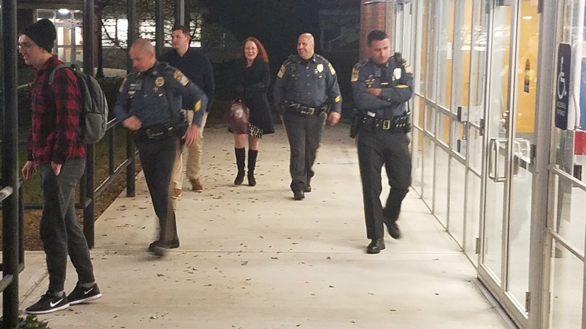 Daugherty and her security detail.jpg