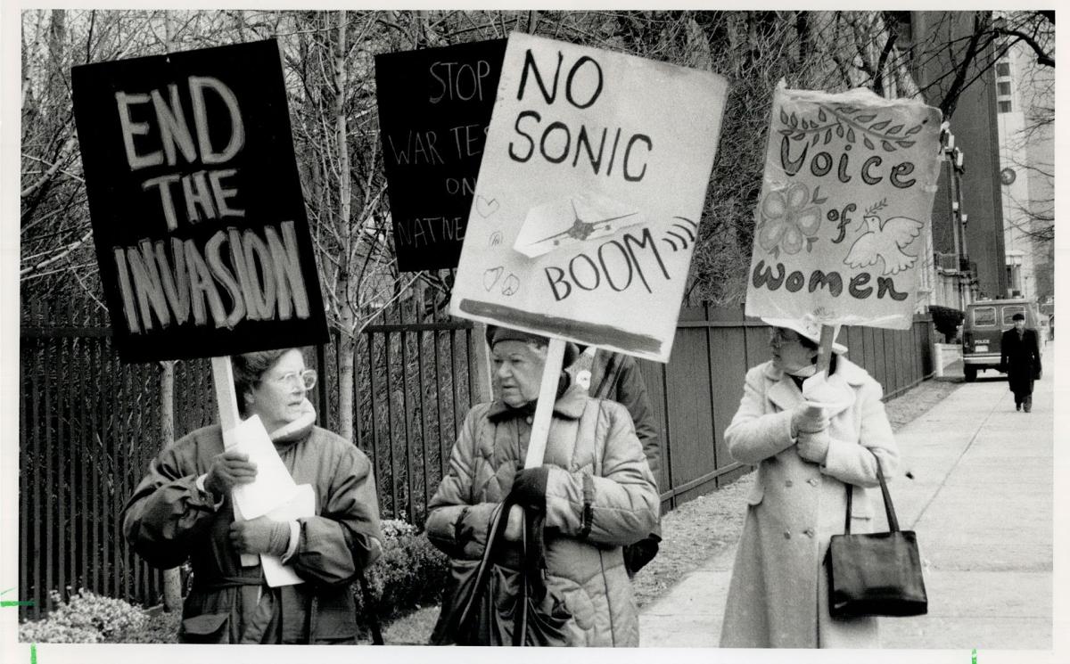 Non-Natives in Toronto in 1990 protesting NATO in support of Innu people who were opposing NATO jet training flights over their territory.